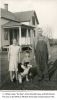 Nels Lausten Rossen on the Mentor farm in Minnesota with his grandchildren Shirley Ann Rossen and James Donald Casey, around 1933
